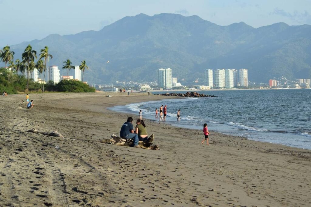 A panoramic view of Puerto Vallarta beach with the Malecon promenade.