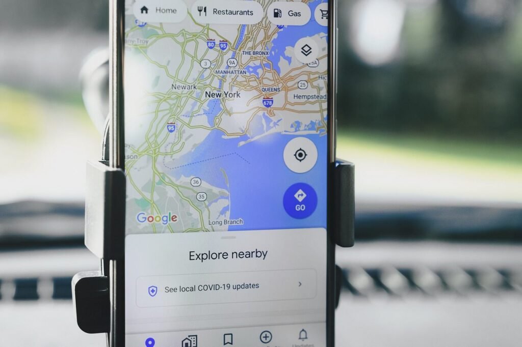 Smartphone displaying Google Maps for navigation and travel planning.